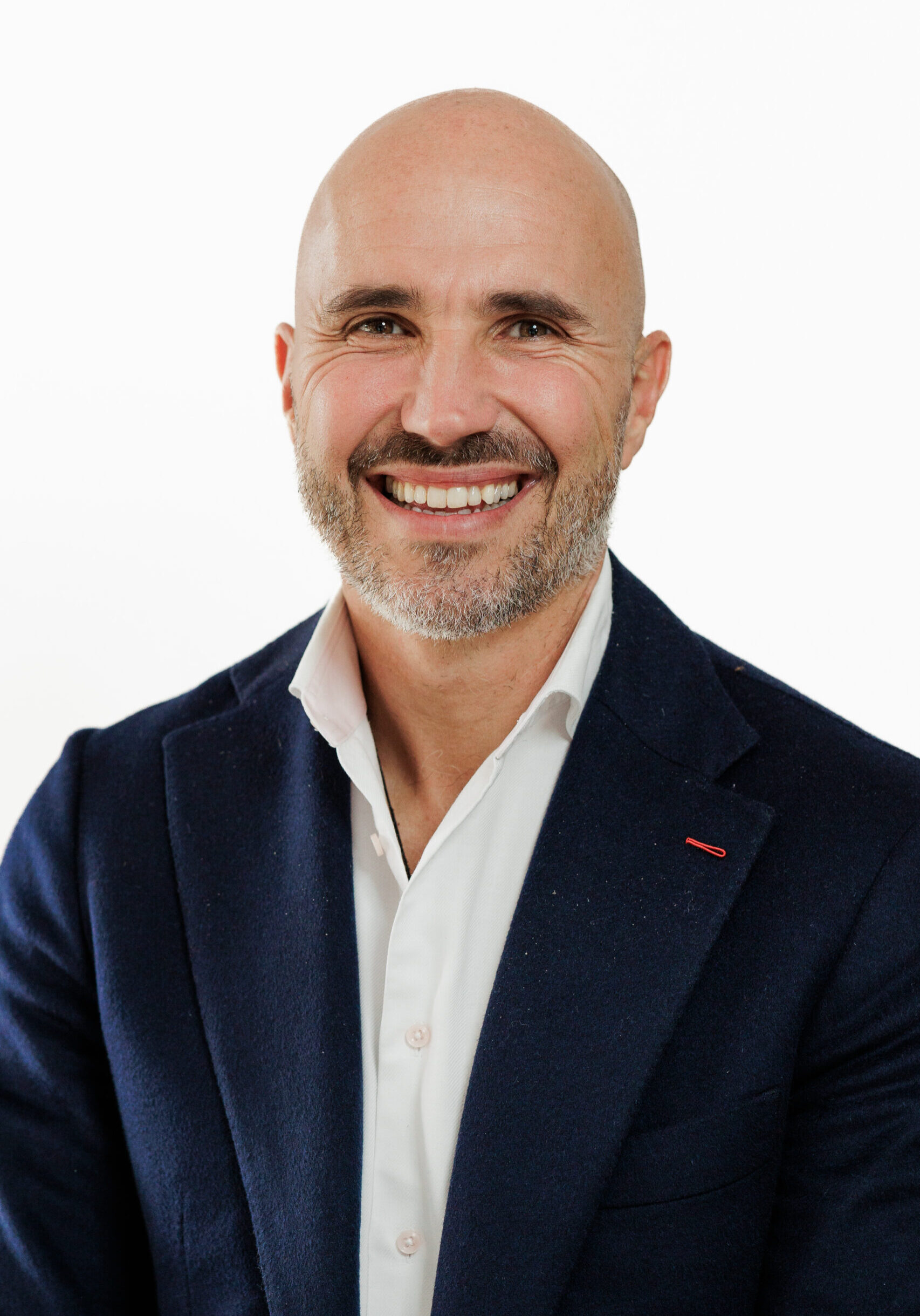 A smiling man, representing a member of the SmartAssessor team.