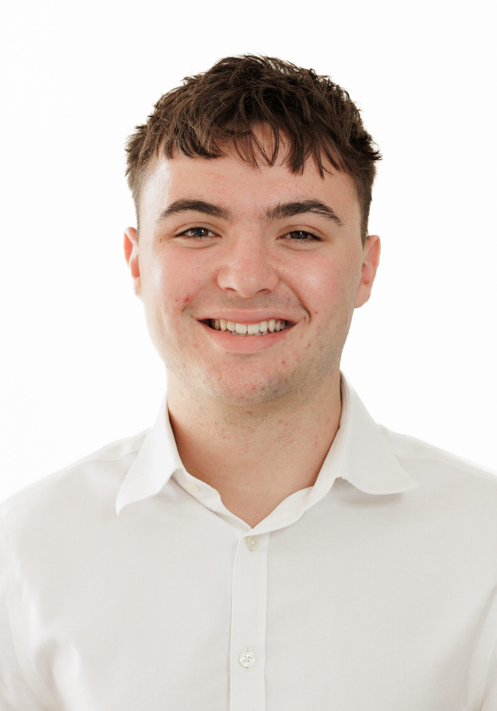 A smiling man, representing a member of the SmartAssessor team.